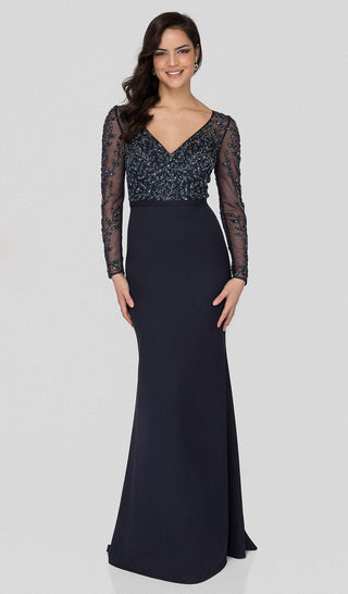 Navy blue formal gown with beaded bodice and long sleeves