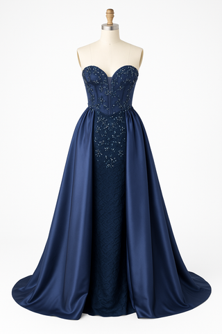 Navy blue strapless formal gown on a mannequin.