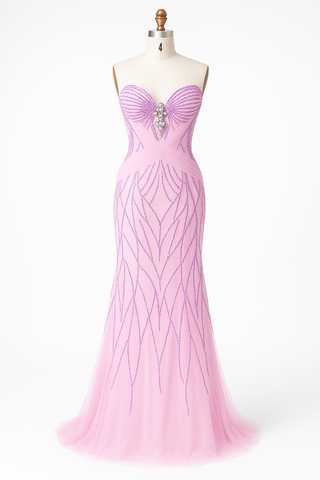 Pink formal gown on a mannequin.
