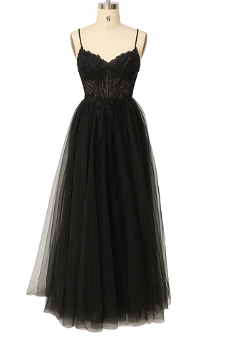 Black lace and tulle gown on a mannequin.