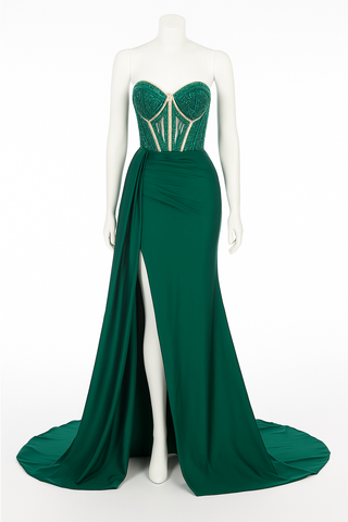 Green strapless evening gown on a mannequin.