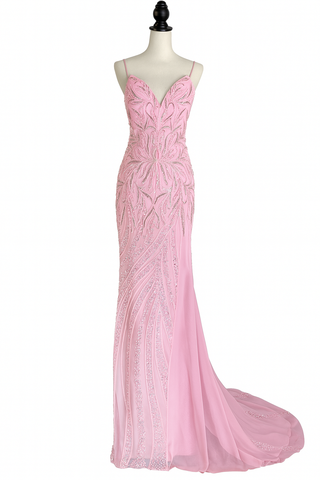 Pink formal gown on a mannequin.