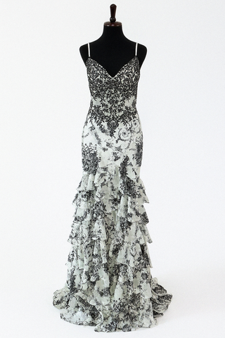 Black and white formal gown on a mannequin.