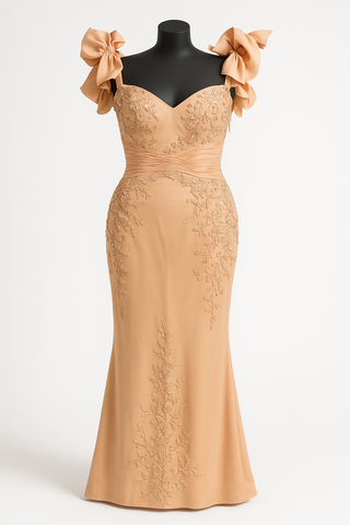 Peach-colored formal gown on a black mannequin.