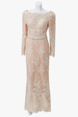 Pink lace evening gown on a mannequin.