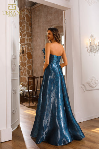 Woman in teal strapless gown
