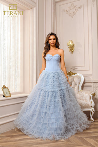 Strapless blue ruffled gown