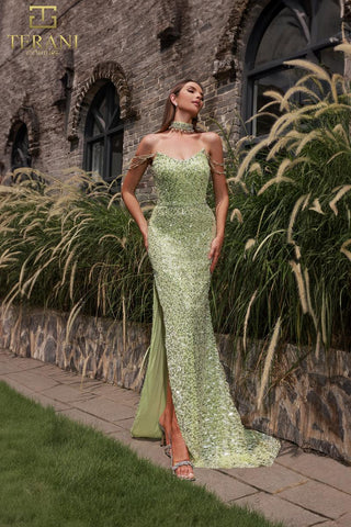 Green sequin gown with high slit.