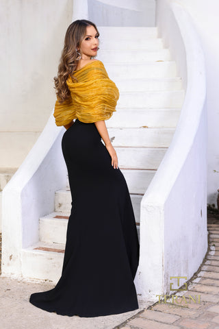 Woman in yellow top and black skirt on stairs (252E5181_70)