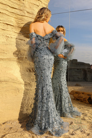 Slate blue off-shoulder gown with floral embellishments and reflection