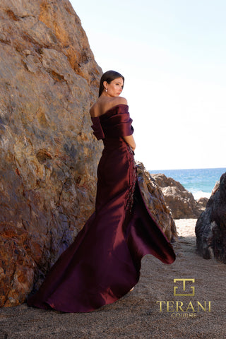 Woman in mauve off-the-shoulder gown by Terani Couture