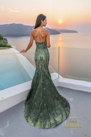 Green evening gown overlooking Santorini