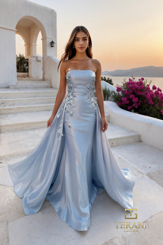 Light blue strapless gown on model