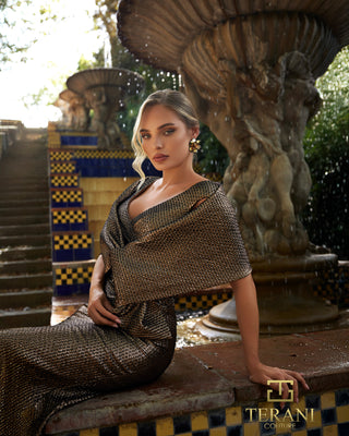 Woman in gold gown by fountain, 261m6450