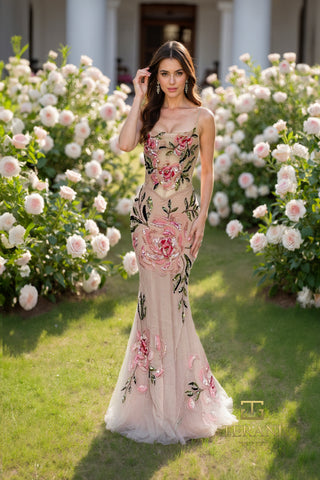 Woman in floral gown, rose garden setting