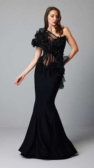 Woman in a black one-shoulder gown.