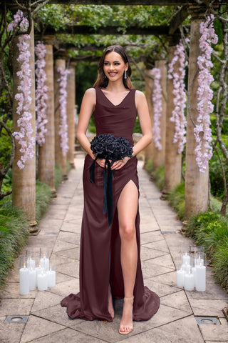 Amelia in burgundy dress holding bouquet