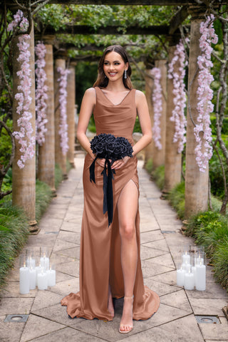 Amelia in Desert Rose dress with bouquet