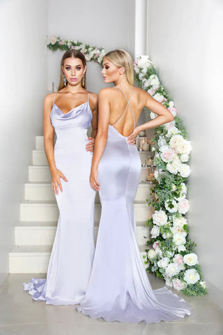 Two women in elegant white dresses