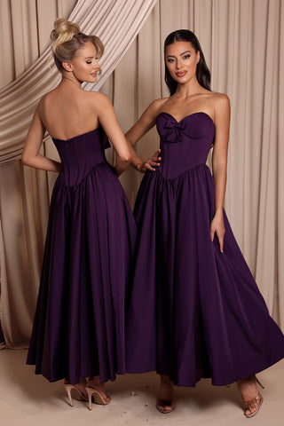 Emma in aubergine dresses