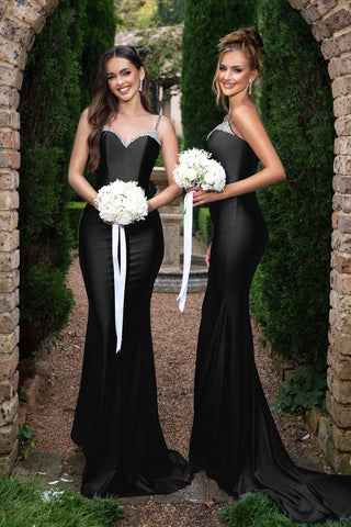 Louise in black gown with bouquet