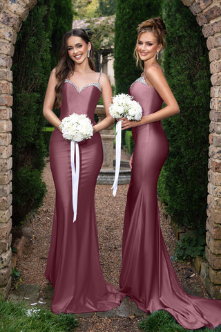 Louise in dusty plum bridesmaid dresses with bouquets