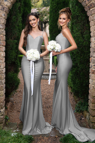 Louise Platinum dresses, two women holding bouquets.
