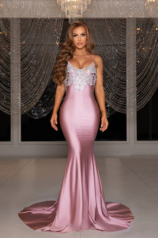 Elegant blush mermaid gown with beaded bodice.