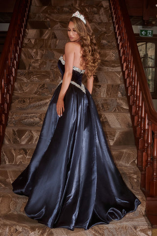 Navy blue formal gown on a staircase