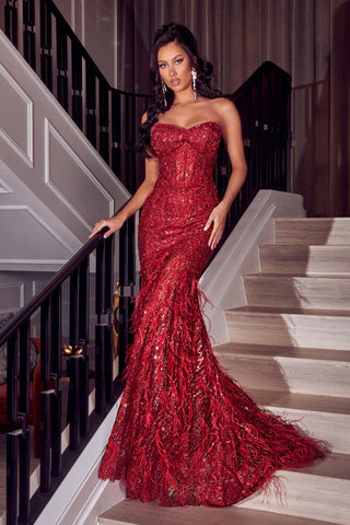 Red sequin gown on stairs