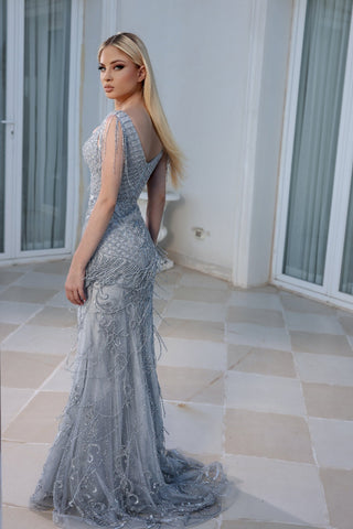 Woman in elegant silver gown