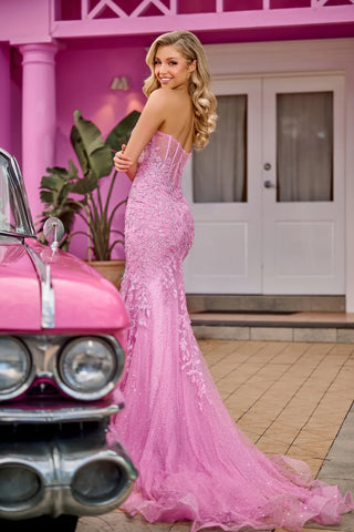 Pink formal gown and classic car