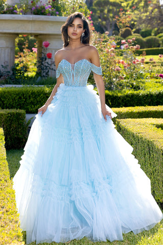 Light blue off-shoulder formal gown PS25303 in garden setting