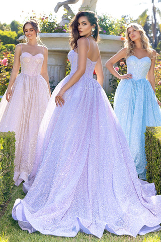 Women in light pink, lilac, and blue formal gowns