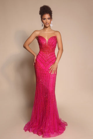 Fuchsia beaded evening gown, PS26004, on a woman.