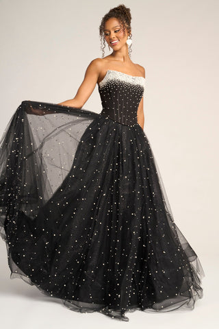 Black strapless formal gown with beaded bodice.