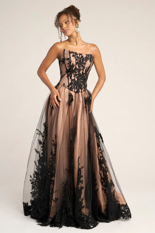 Black and nude strapless gown with lace detailing.