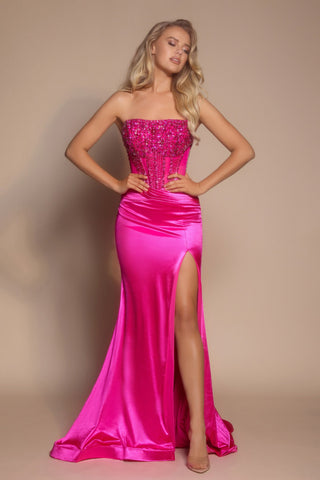 Hot pink formal gown with high slit.