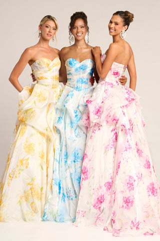 Three women in floral print gowns