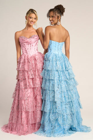 Two women in pink and blue tiered formal dresses