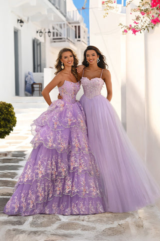 Two women in lilac prom dresses