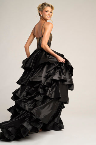 Black formal gown with tiered skirt.