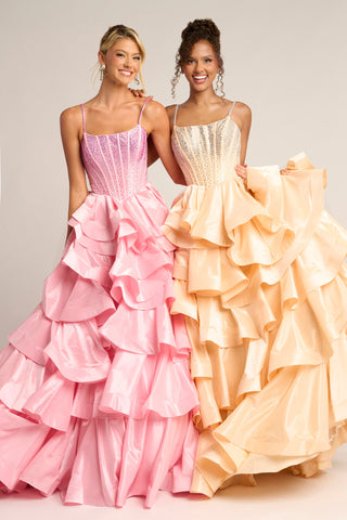 Two women in Pink Champagne prom dresses