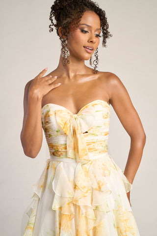 Yellow floral strapless dress on woman