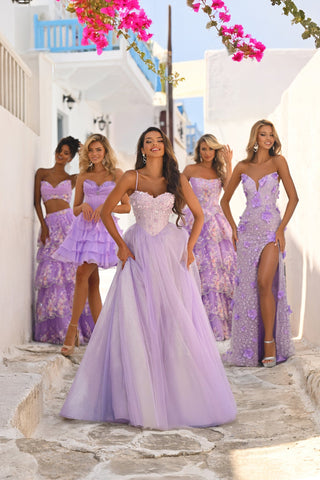 Lilac gowns in a white alley