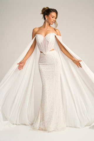 White beaded formal gown with cape sleeves