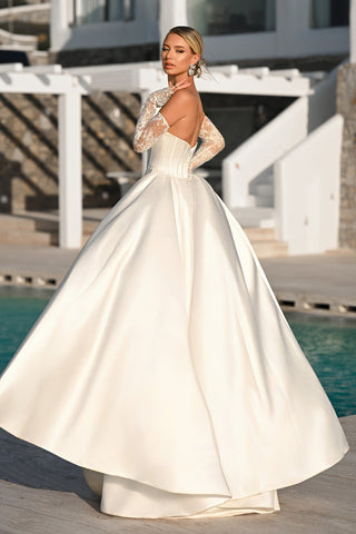 Ivory nude wedding dress PS26328E, elegant bride by pool.
