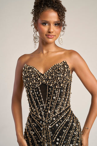 PS26403C Black & Gold beaded gown on a woman