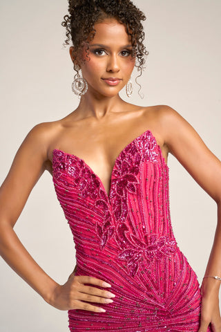 Hot pink embellished gown on woman