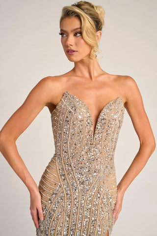 Champagne beaded gown with plunging neckline.